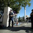 Armed police stand guard outside the Al Noor mosque in Christchurch, where most of the victims of a mass shooting on March 15 died