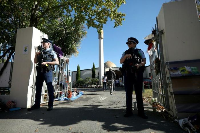 Armed police stand guard outside the Al Noor mosque in Christchurch, where most of the victims of a mass shooting on March 15 died