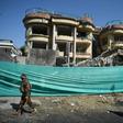 The massive explosion felled trees and toppled dense concrete blast walls on the street outside the Counterpart International compound in Kabul