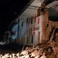 Handout picture released by the Peruvian Fire Department showing a house damaged by an 8.0 earthquake in Yurimaguas, Peru, early on May 26