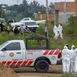 Forensic and civil protection personnel work at a clandestine grave where local authorities have found at least 16 bodies, in Agua Escondida neighborhood,in Tonala, Jalisco state, Mexico, in October 2018.