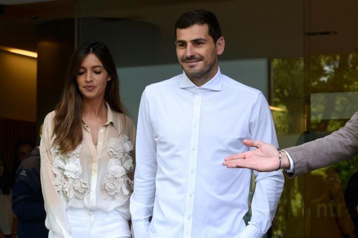 Casillas leaves hospital with his wife on Monday after suffering a heart attack last month