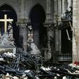 Charred debris in front of the altar at Notre-Dame cathedral in Paris in the aftermath of a devastating blaze which destroyed the monument's roof