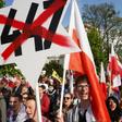 Far-right supporters who marched from the prime minister's office to the US embassy waved banners reading "No to claims", "Shame" and "Stop 477" 