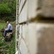 Jovan Plaku unearthed the remains of 13 people after hunting for the body of his father, executed by Albania's ex-communist regime