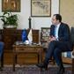 EU chief Brexit negotiator Michel Barnier (L) and Cypriot Foreign Minister Nikos Christodoulidis meet in Nicosia on May 20, 2019