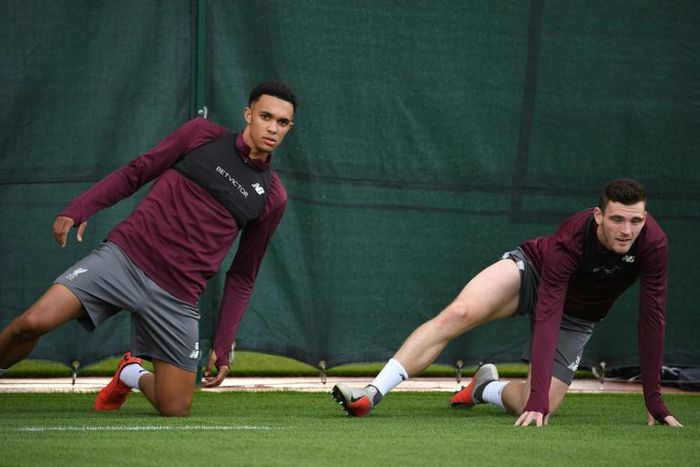 Liverpool defenders Trent Alexander-Arnold (left) and Andrew Robertson have 24 assists between them this season