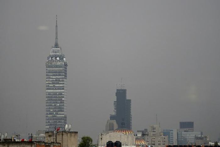 Mexico City is naturally prone to air pollution: it is surrounded by a ring of mountains that often trap smog over the capital, preventing it from dissipating