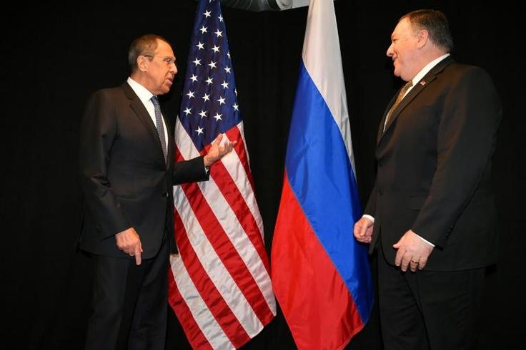 Pompeo (r) and Russian cunterpart Sergei Lavrov have urged each other's country to get out of Venezuela