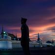 Police stand guard near the Grand Palace in Bangkok ahead of the coronation of Thailand's King Maha Vajiralongkorn