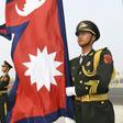 Chinese members of a guard of honour hold Nepalese and Chinese flags ahead of a welcoming ceremony for Nepal's President Bidhya Devi Bhandar at the Great Hall of the People in Beijing on April 29, 2019