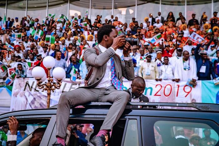 The official photographer of President Muhammadu Buhari, Mr Bayo Omoboriowo [Twitter/@tolanialli]