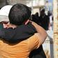 Prisoners held by the Syrian government reunite with relatives during a prisoner exchange between the Syrian government and Hayat Tahrir al-Sham (HTS) in the countryside of the rebel-held Idlib province on May 17, 2019.