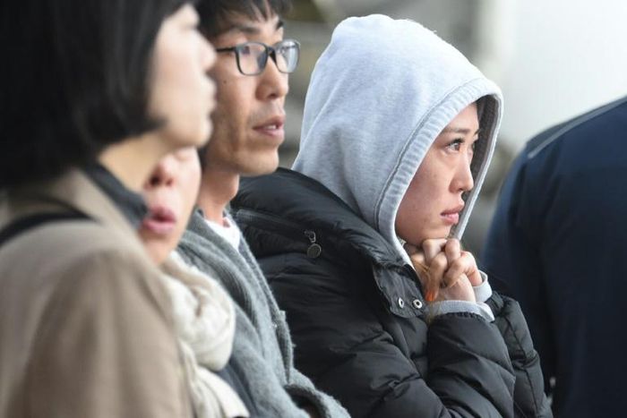 Some people waited anxiously on the banks of the Danube river for news of those still missing from the sightseeing boat, most of them South Korean tourists