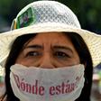 A woman with a surgical mask reading "Where are they?" takes part in a march of activists and relatives of missing people to demand answers on the whereabouts of their loved ones, as part of the commemoration of Mothers' Day in Mexico City
