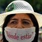 A woman with a surgical mask reading "Where are they?" takes part in a march of activists and relatives of missing people to demand answers on the whereabouts of their loved ones, as part of the commemoration of Mothers' Day in Mexico City