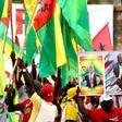 Activists of the African Party for the Independence of Guinea and Cape Verde (PAIGC) hold a picture of Guinea-Bissau's party leader Domingos Simoes Pereira during a rally in March 2019
