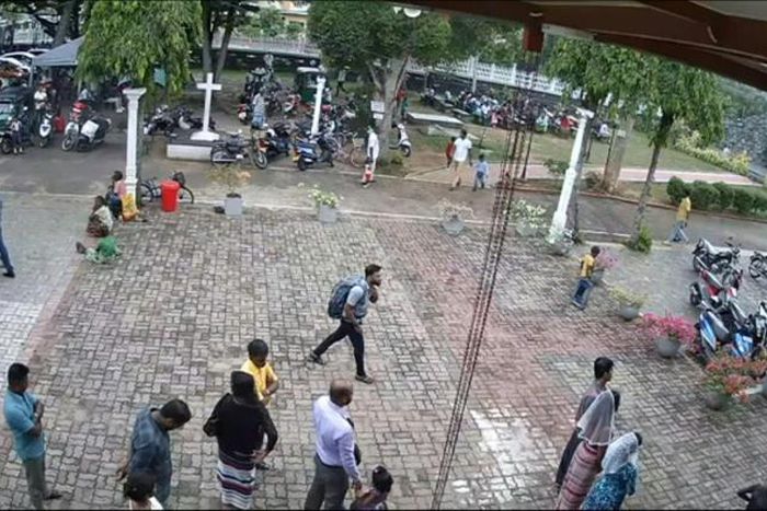 A still taken from Sri Lankan closed-circuit TV shows a suspected suicide bomber wearing a backpack on his way to St Sebastian's Church in Negombo, Sri Lanka, where dozens were killed
