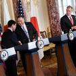 Secretary of State Mike Pompeo shakes hands with Japanese Foreign Minister Taro Kono as the allies' defense chiefs look on