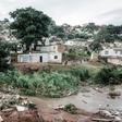 People abandon their homes at an informal settlement of BottleBrush, south of Durban, after torrential rains and flash floods destroyed their homes