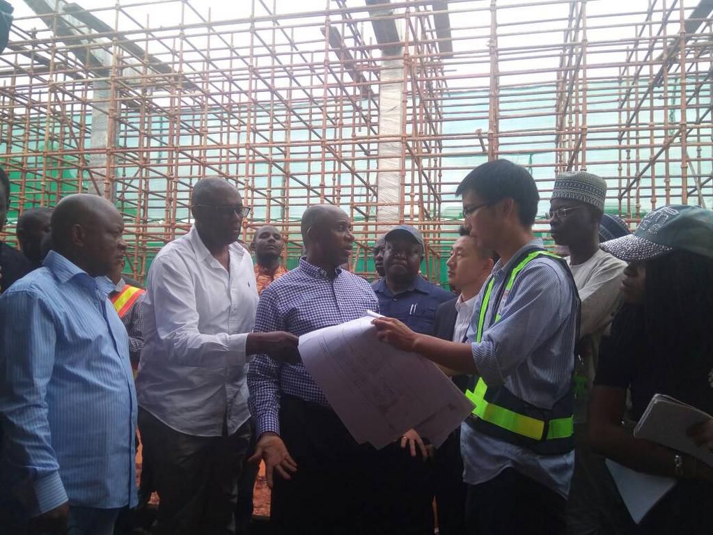 Transport Minister, Rotimi Amaechi, queries contractors on slow pace of the construction of Train Stations at the Itakpe-Ajaokuta-Warri rail line.
