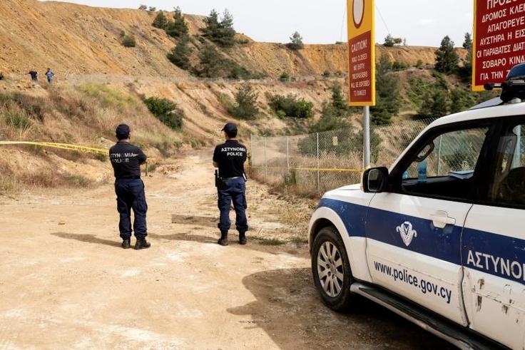 Cyprus forensic police cordon off a lake southwest of the capital Nicosia where a suspected serial killer has confessed to dumping the bodies of some of his victims
