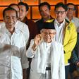 Indonesian President Joko Widodo (C) looks set for a second terms after unofficial 'quick count' results gave him a 9-11 point lead