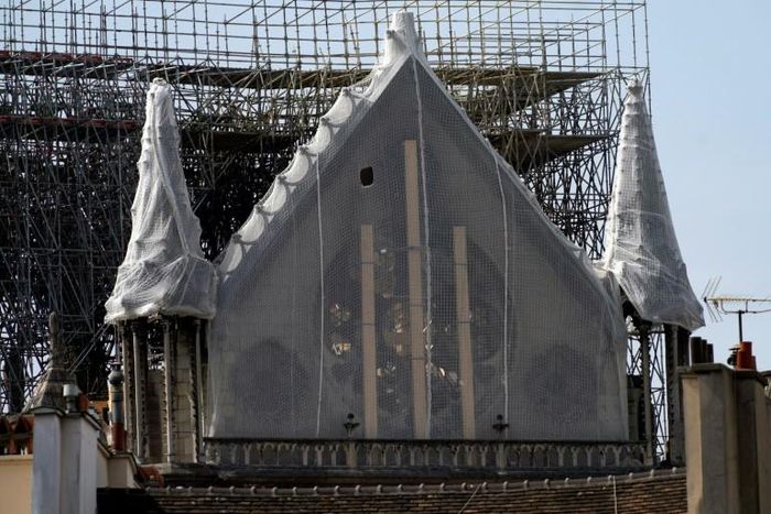 French Catholics celebrated Easter mass in Paris in the shadow of the badly burned cathedral