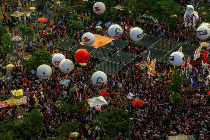 People take part in a demonstration against the Brazilian government's plan to slash education spending, in Sao Paulo