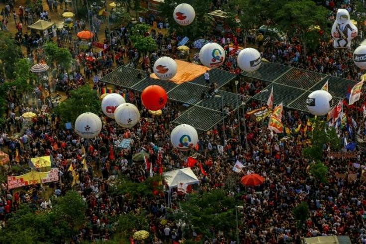 People take part in a demonstration against the Brazilian government's plan to slash education spending, in Sao Paulo