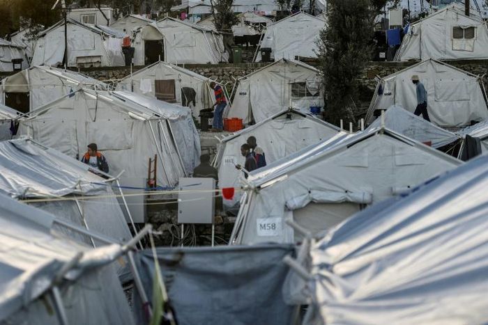 The 7,000, refugees and migrants who live on Lesbos outnumber the local population by 2.5 to one