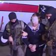 Egyptian state television broadcast footage of wanted jihadist Hisham Ashmawy being escorted off a plane in Cairo by intelligence agents