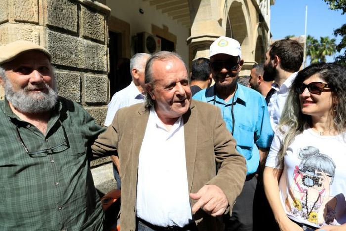 Sener Levent is greeted by supporters as he leaves the Supreme Court of the Turkish Republic of Northern Cyprus on May 16