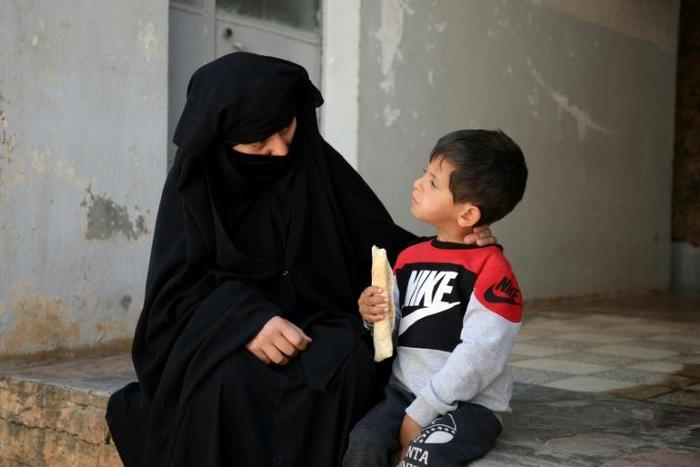 Hasna Dbeis spent four years in regime prisons, where she gave birth to her son Mohammad