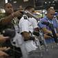 Visitors inspect guns during a security and defense expo in Rio de Janeiro, Brazil, on April 02, 2019