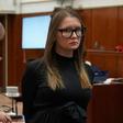 Fake German heiress Anna Sorokin is led away after being sentenced in Manhattan Supreme Court following her conviction last month on multiple counts of grand larceny and theft of services
