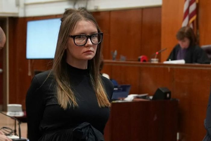 Fake German heiress Anna Sorokin is led away after being sentenced in Manhattan Supreme Court following her conviction last month on multiple counts of grand larceny and theft of services