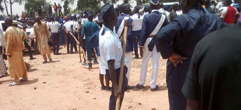 Sympathisers, Boys Brigade members at Christian Cemetry in Gombe during the burial of slain brigade members on Easter Sunday (Punch)