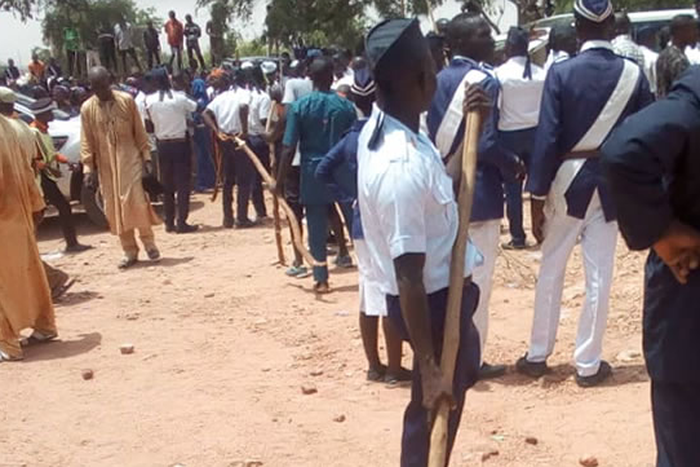 Sympathisers, Boys Brigade members at Christian Cemetry in Gombe during the burial of slain brigade members on Easter Sunday (Punch)