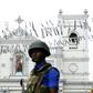 With armed guards now a fixture in Colombo after the Easter bombings, holiday cancellations are flooding in