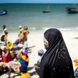 Man Yam, 19, endures the wait for aid on Ibo where the majority of the population is Muslim