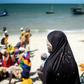 Man Yam, 19, endures the wait for aid on Ibo where the majority of the population is Muslim