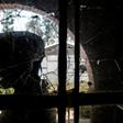 A bullet-shattered window at an Ebola treatment centre in Butembo after it came under attack on March 9. A policeman was killed and a health worker wounded