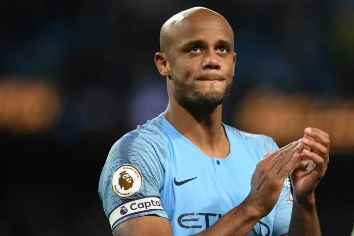 Vincent Kompany applauds the fans after Manchester City's crucial win against Leicester