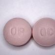 This undated handout file photo obtained courtesy of the US Drug Enforcement Administration shows 20 mg pills of the opioid painkiller OxyContin