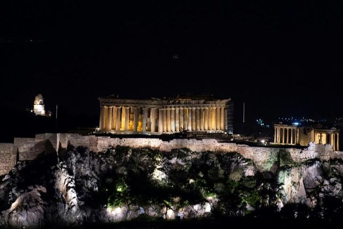 A bolt of lightning struck the Acropolis in Athens, hitting two tourists and two Greeks working at a ticket booth at the site