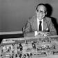Architect I.M. Pei poses with the architectural model of the Louvre Pyramid in Paris in 1985