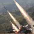 This May 9, 2019 picture released from North Korea's official Korean Central News Agency (KCNA) shows rocket launchers firing during a drill by units of the Korean People's Army