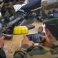 Fighters loyal to the internationally recognised Government of National Accord take a break from the front line to play an online combat game on their phones at their base in Tajoura, south of the Libyan capital Tripoli