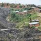 Four people died, and one is still missing, after a rubbish dump gave way and tore through the modest settlement of Chibuabuar in northern Mozambique